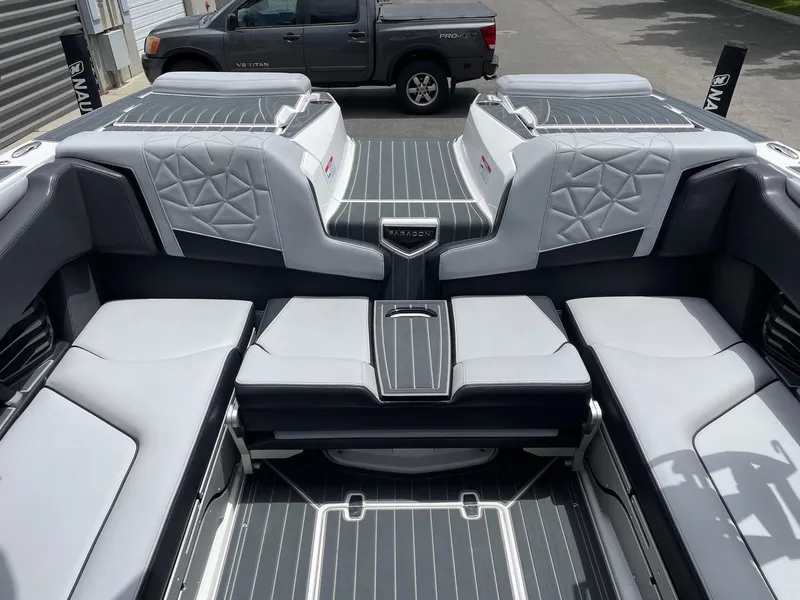 Slide: The Image of 2023 Nautique Super Air Nautique G23 Paragon interior with luxurious seating. - 9