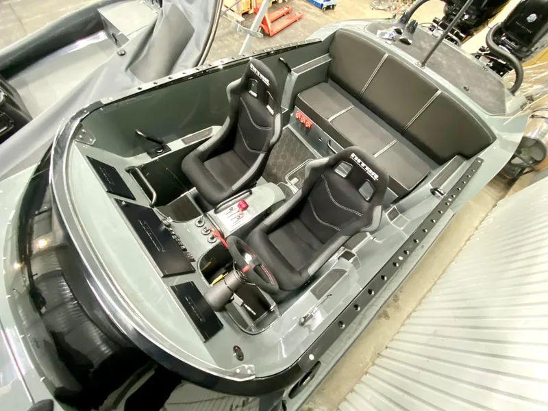 Slide: The Image of 2021 Nitra Boats 29 interior with dual racing seats and modern dashboard. - 3