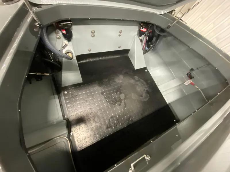 Slide: The Image of 2021 Nitra Boats 29 interior storage compartment with black rubber mat. - 4