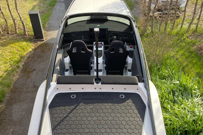 Slide: The Image of Top view of 2022 Nitra Boats 30 SkyTop interior and deck. - 7