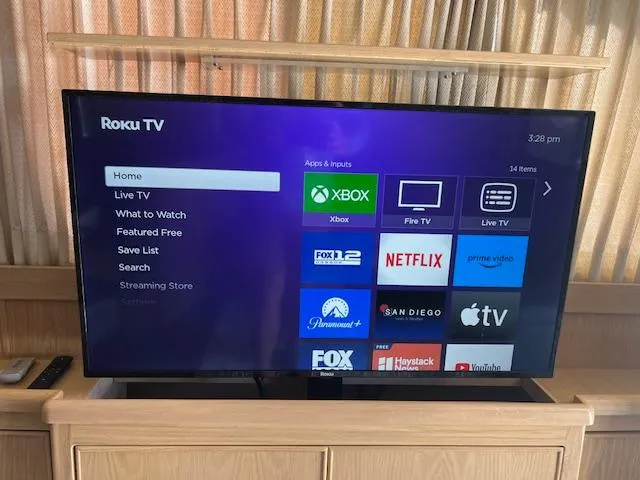 Slide: The Image of Roku TV interface on a 1997 Riviera 43 Open Flybridge yacht. - 23