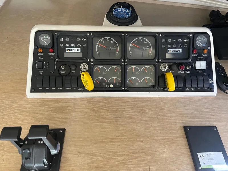 Slide: The Image of Dashboard of a 1997 Riviera 43 Open Flybridge with instruments. - 24