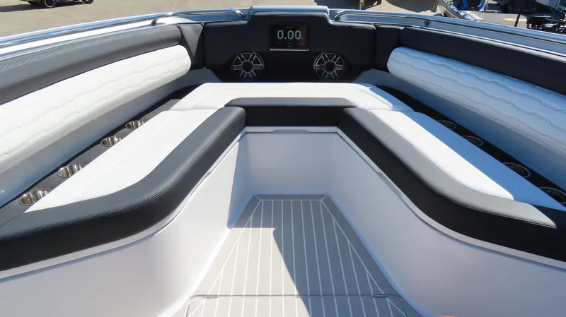 Slide: The Image of 2024 Cigarette 41 Nighthawk SD Edition boat interior with cushioned seating and digital display. - 20