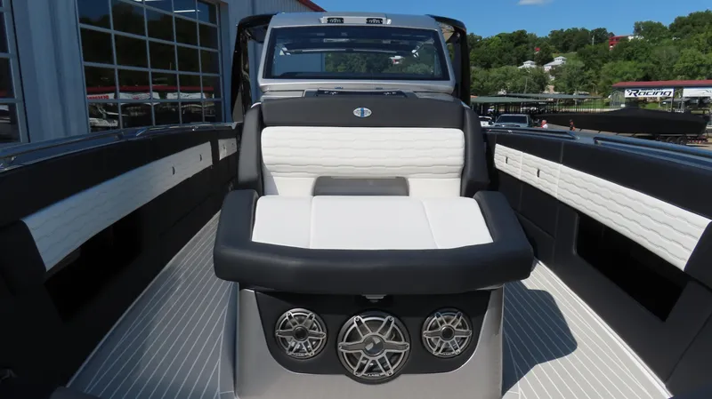 Slide: The Image of 2024 Cigarette 41 Nighthawk SD Edition boat interior with premium seating and sound system. - 22
