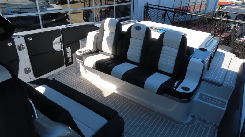 Slide: The Image of 2024 Cigarette 41 Nighthawk SD Edition boat interior with black and white seating. - 37