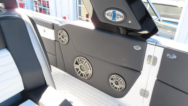 Slide: The Image of 2024 Cigarette 41 Nighthawk SD Edition boat interior with premium speakers. - 38