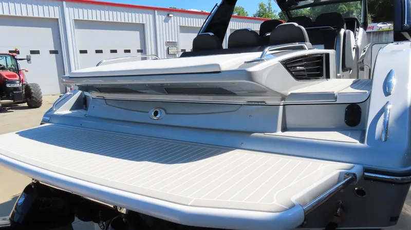 Slide: The Image of 2024 Cigarette 41 Nighthawk SD Edition boat rear view at marina. - 7