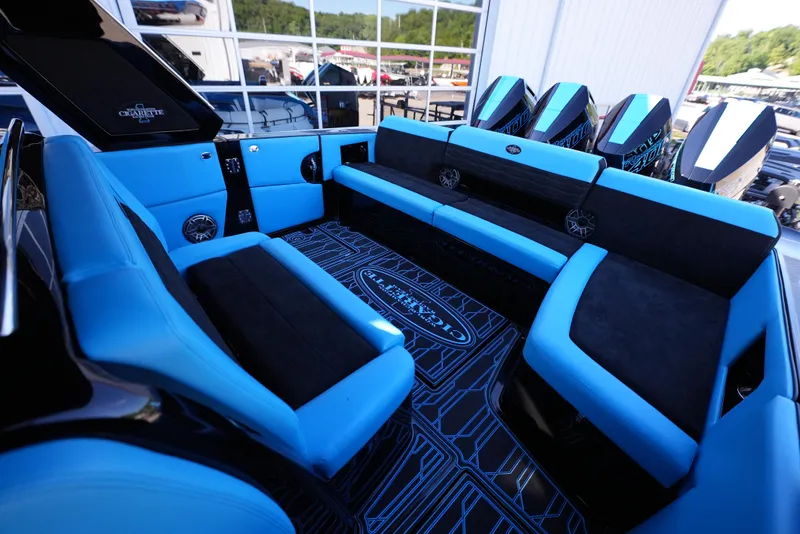 Slide: The Image of 2025 Cigarette 41 Nighthawk boat interior with blue and black seating. - 10