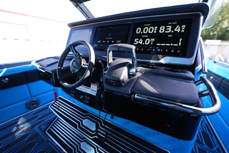 Slide: The Image of Cockpit of 2025 Cigarette 41 Nighthawk with advanced navigation displays and controls. - 16