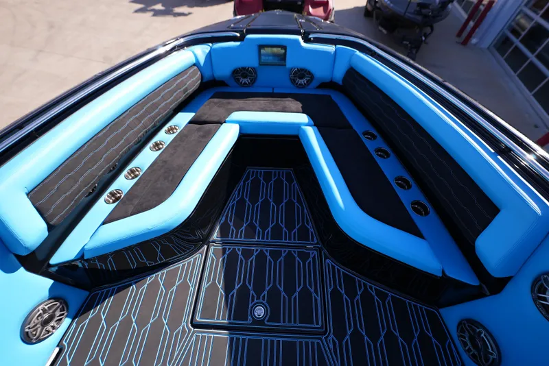 Slide: The Image of 2025 Cigarette 41 Nighthawk boat interior with blue and black seating. - 18