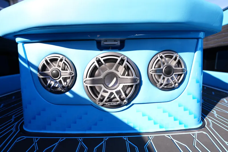 Slide: The Image of Close-up of 2025 Cigarette 41 Nighthawk boat's blue audio system speakers. - 23