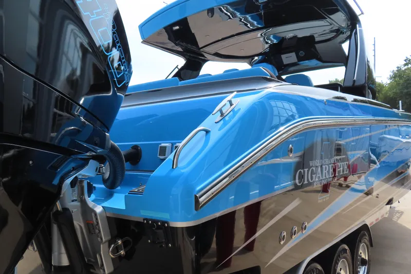 Slide: The Image of 2025 Cigarette 41 Nighthawk boat, blue exterior, powerful engines, sleek design. - 35