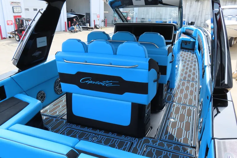 Slide: The Image of 2025 Cigarette 41 Nighthawk boat interior with blue seating and modern design. - 37