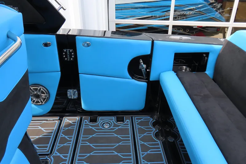 Slide: The Image of 2025 Cigarette 41 Nighthawk interior with blue seating and modern design elements. - 41