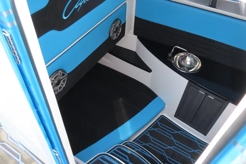 Slide: The Image of Interior of 2025 Cigarette 41 Nighthawk boat with blue seating and compact sink. - 56