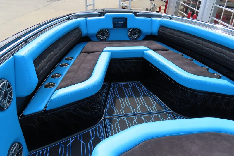Slide: The Image of 2025 Cigarette 41 Nighthawk boat interior with blue seating and modern design. - 57