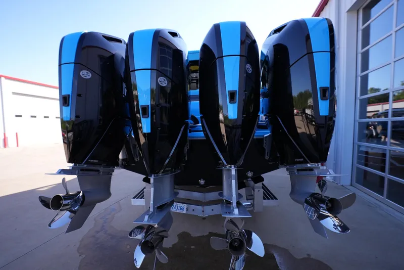 Slide: The Image of 2025 Cigarette 41 Nighthawk boat with four powerful outboard engines. - 7