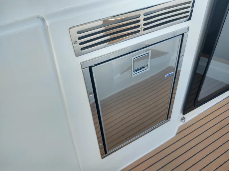 Slide: The Image of Total Chaos 9 cockpit fridge  - 20