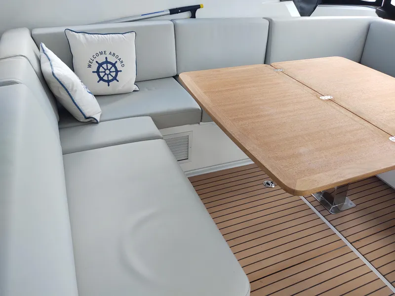 Slide: The Image of Total Chaos 9 stbd seating and table extended  - 23