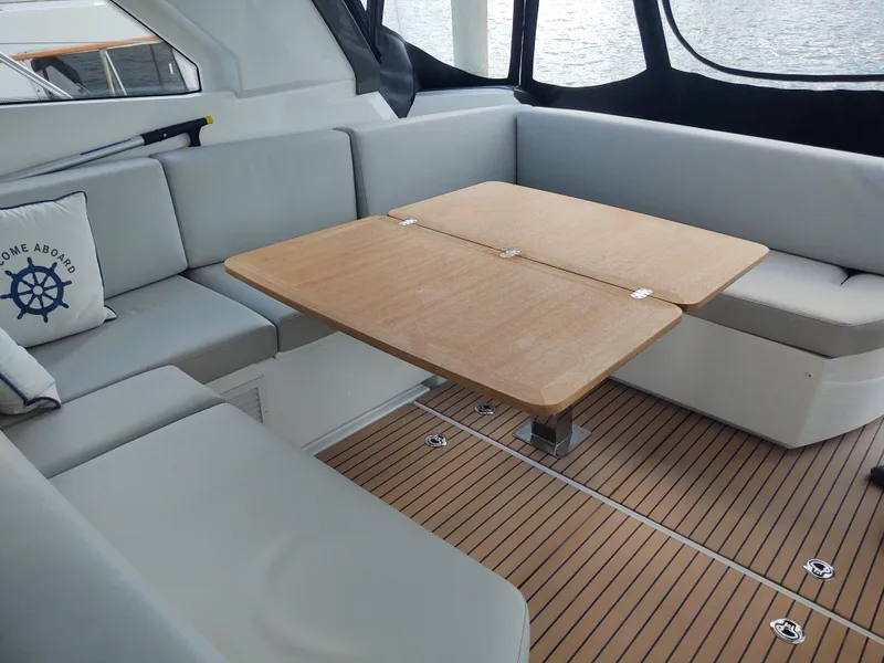 Slide: The Image of Total Chaos 9 stbd seating and table extended - 24