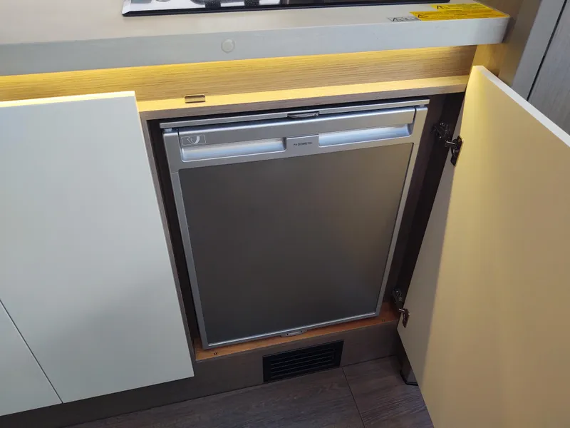 Slide: The Image of Total Chaos 9 galley refridgerator  - 45