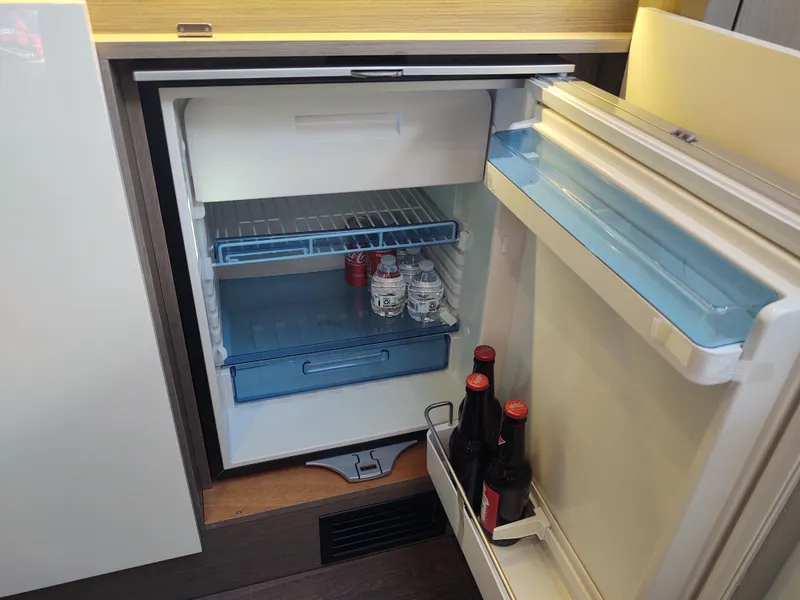 Slide: The Image of Total Chaos 9 galley refridgerator open - 46