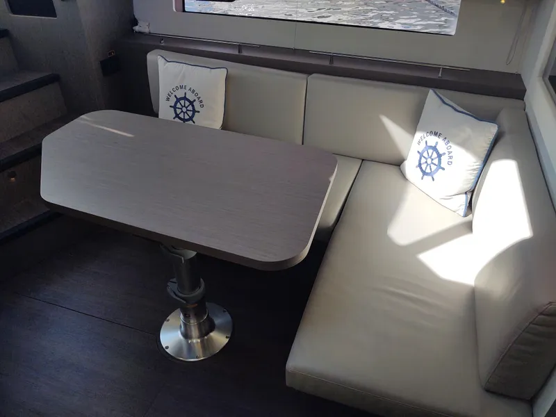 Slide: The Image of Total Chaos 9 port settee and table  - 48