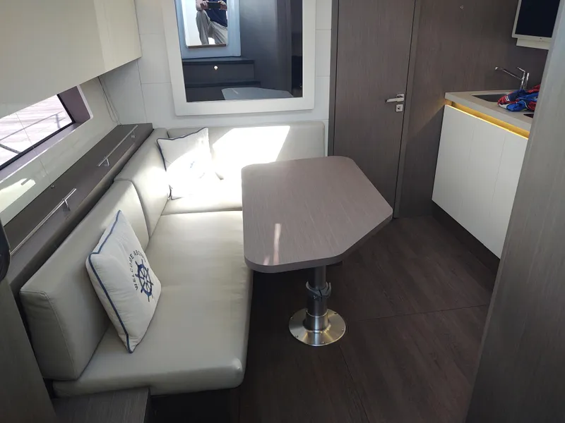 Slide: The Image of Total Chaos 9 port settee and table  - 49