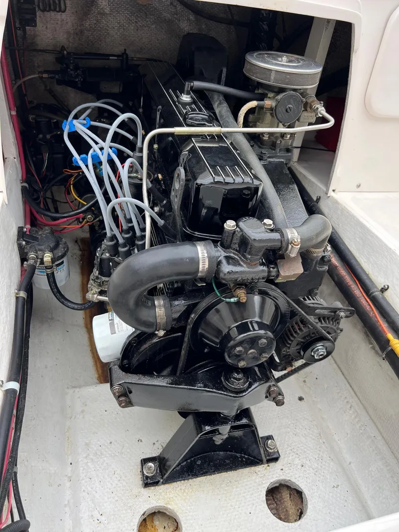 Slide: The Image of 1969 Bertram Bahia Mar 20 engine compartment with visible engine components. - 3