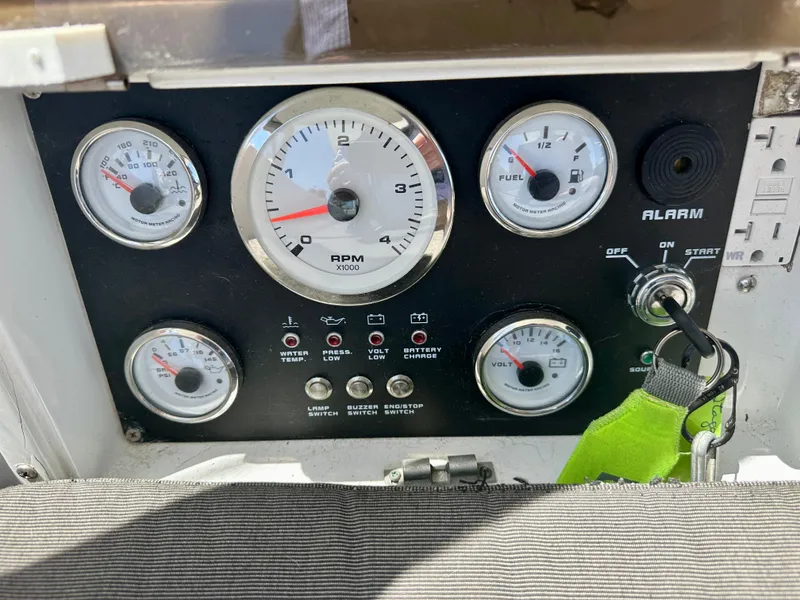 Slide: The Image of Control panel of a 1983 Tayana 55 sailboat with gauges and ignition key. - 39
