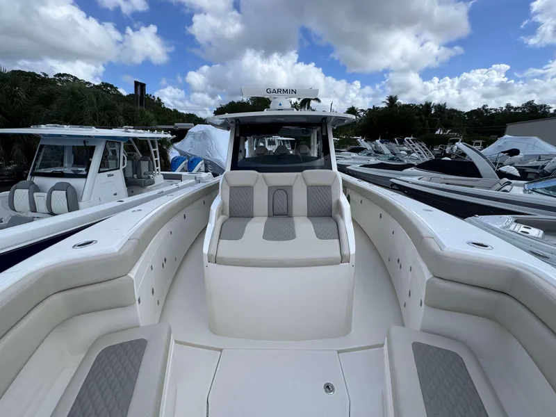 Slide: The Image of Solace 41 CS 2025 model luxury boat with spacious seating and modern design. - 10