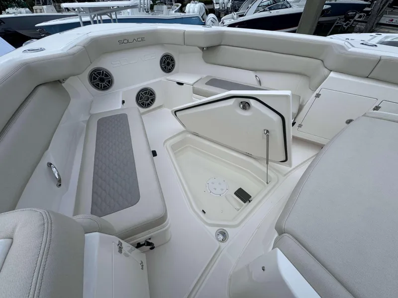 Slide: The Image of Interior seating and storage of 2025 Solace 41 CS boat. - 12