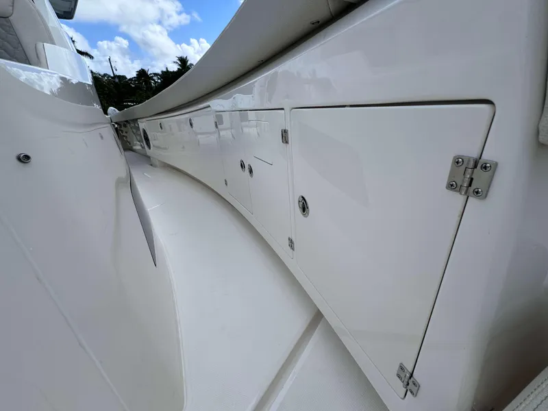 Slide: The Image of Side view of 2025 Solace 41 CS boat storage compartments. - 13