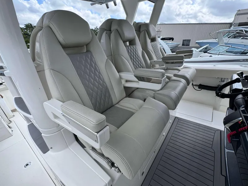 Slide: The Image of Luxurious seating on the 2025 Solace 41 CS boat, featuring plush, ergonomic design. - 22