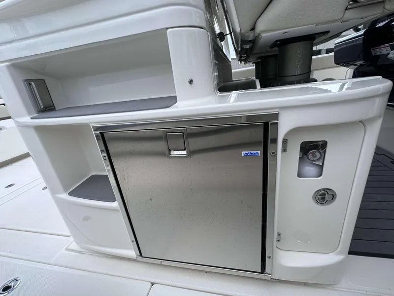 Slide: The Image of Stainless steel storage compartment on a 2025 Solace 41 CS boat. - 23