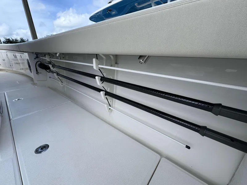 Slide: The Image of Interior view of 2025 Solace 41 CS boat with rod holders. - 32