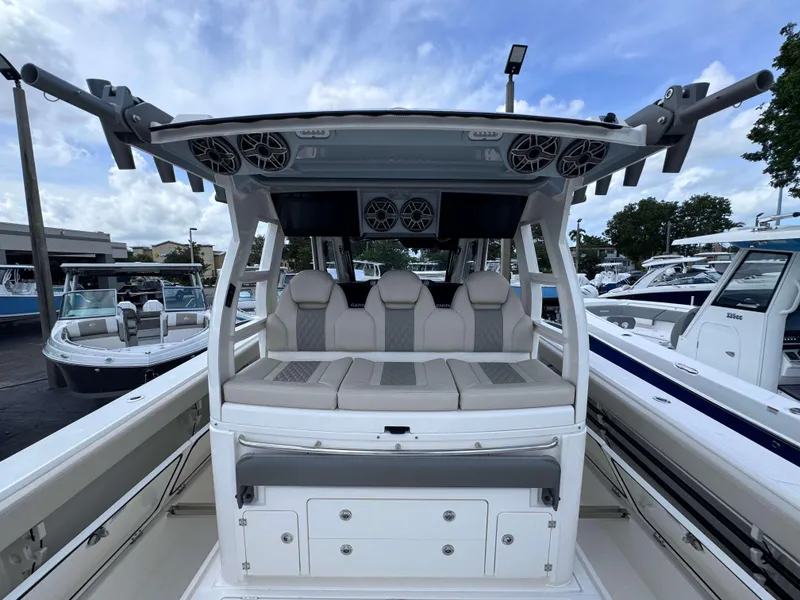 Slide: The Image of 2025 Solace 41 CS boat interior with cushioned seating and overhead speakers. - 39