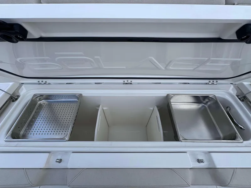 Slide: The Image of Solace 41 CS 2025 boat storage compartment with stainless steel trays. - 44