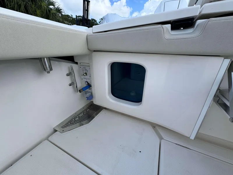 Slide: The Image of Interior view of 2025 Solace 41 CS boat with storage compartment. - 48