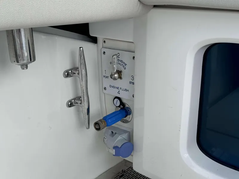 Slide: The Image of Engine flush system on a 2025 Solace 41 CS boat. - 49