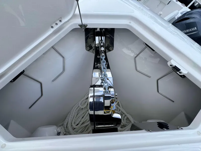Slide: The Image of Anchor compartment of 2025 Solace 41 CS boat with chain and rope. - 9