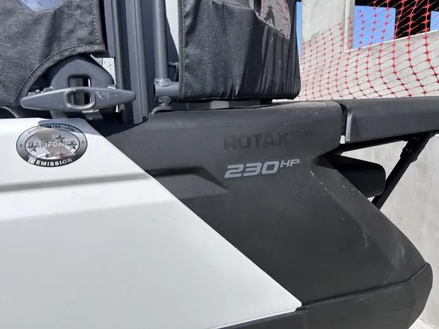 Slide: The Image of 2024 Sea-Doo Switch® Cruise 21, 230 hp, close-up of side panel and emission badge. - 3