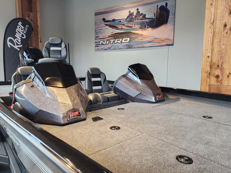 Slide: The Image of 2024 Ranger RT198P boat interior with seating and storage compartments. - 3