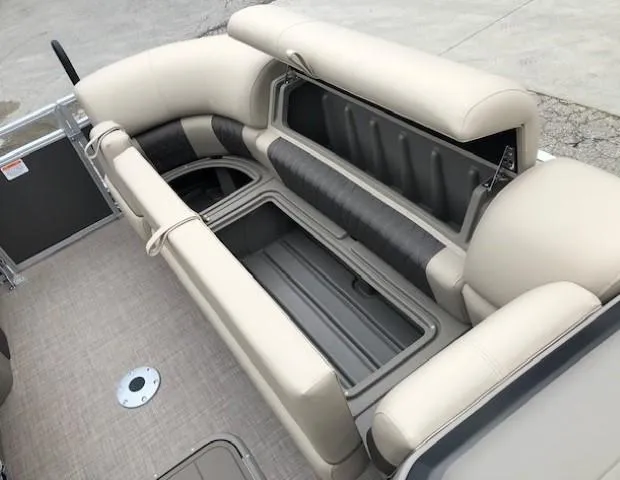 Slide: The Image of 2024 Sun Tracker Party Barge 22 XP3 interior seating and storage compartments. - 10