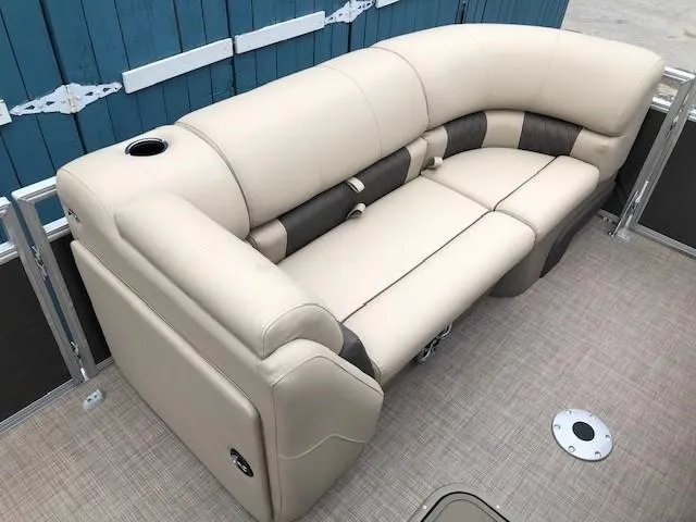 Slide: The Image of 2024 Sun Tracker Party Barge 22 XP3 beige seating area with cup holder. - 11