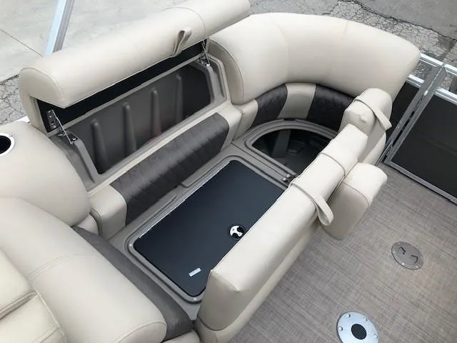 Slide: The Image of 2024 Sun Tracker Party Barge 22 XP3 interior seating and storage compartments. - 27