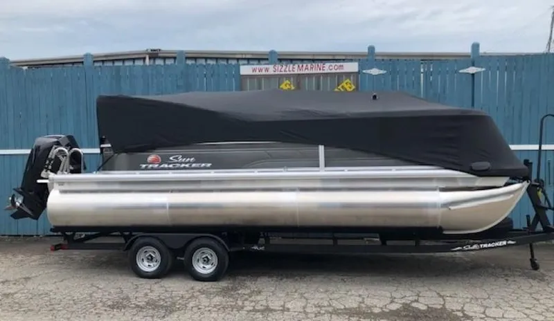 Slide: The Image of 2024 Sun Tracker Party Barge 22 XP3 pontoon boat with cover on trailer. - 32