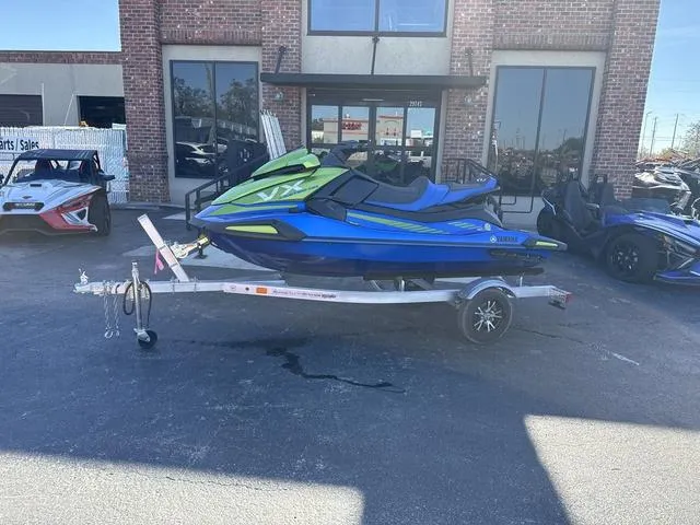 Slide: The Image of 2024 Yamaha Marine Waverunner VX LIMITED HO in azure blue and green. - 1
