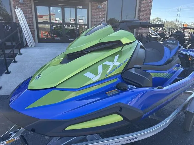 Slide: The Image of 2024 Yamaha Marine Waverunner VX Limited HO in azure blue and green, featuring advanced controls. - 4
