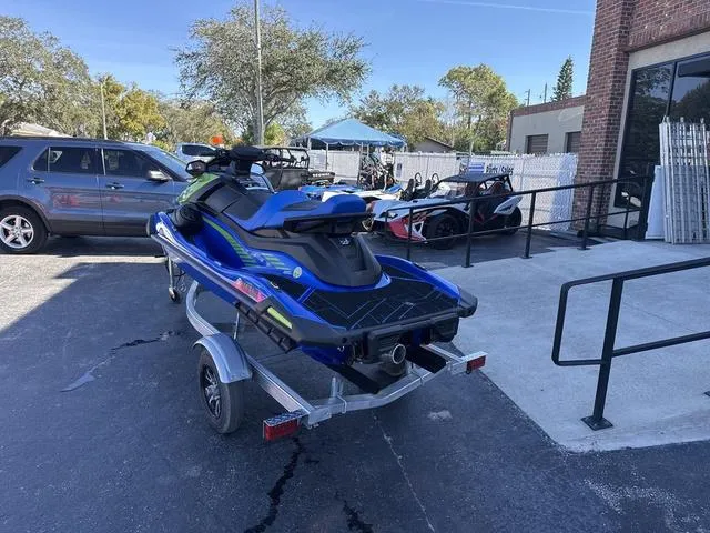 Slide: The Image of 2024 Yamaha Marine Waverunner VX LIMITED HO in azure blue, showcasing storage compartment. - 6